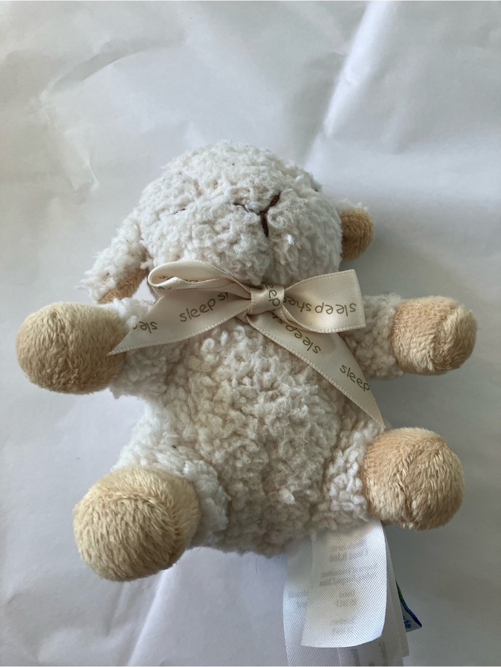 Cloud B Cream Lamb Rattle with Blue Logo Ribbon